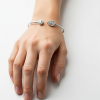 PEAR & BAGUETTE STONED SILVER BANGLE