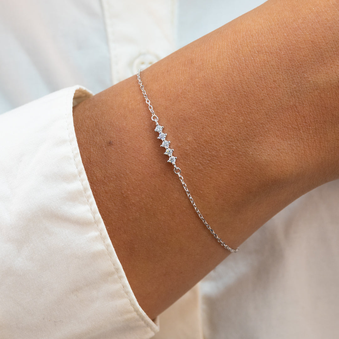 LINE OF ROUND STONES SILVER BRACELET