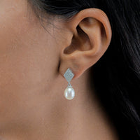 DROPPING OVAL PEARL STUD SILVER EARRING