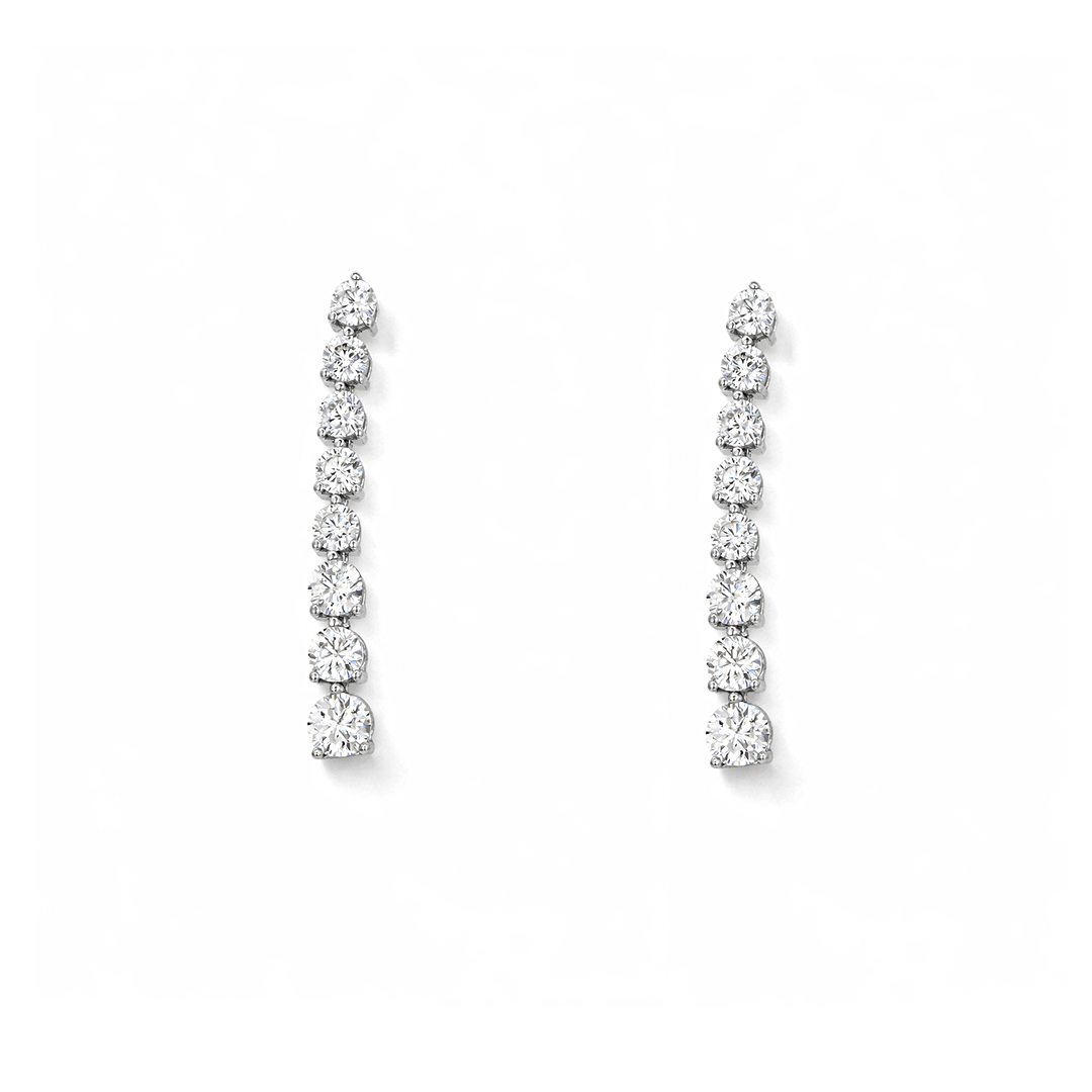 DROPPING GRADIENT TENNIS STUD SILVER EARRING
