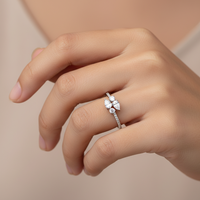 SIMPLE PEAR & ROUND STONED OPEN SILVER RING